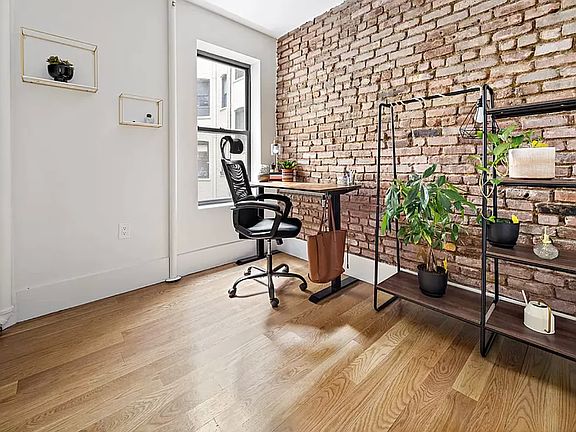 5th image of 321 E 12th St APT 8
