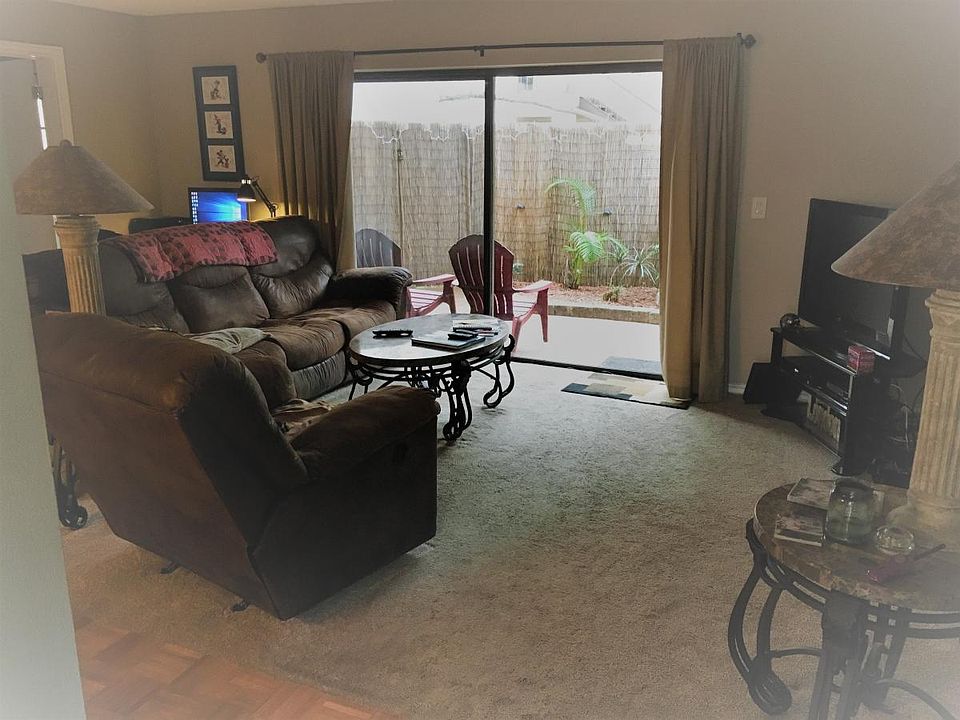 Open plan living room looking out to the private patio area