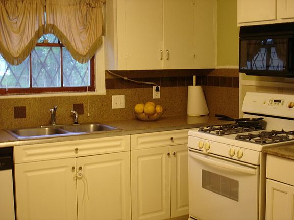 Granite tile counter top and backsplash