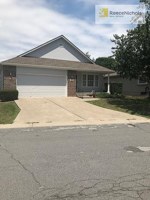 Two car garage with openers.