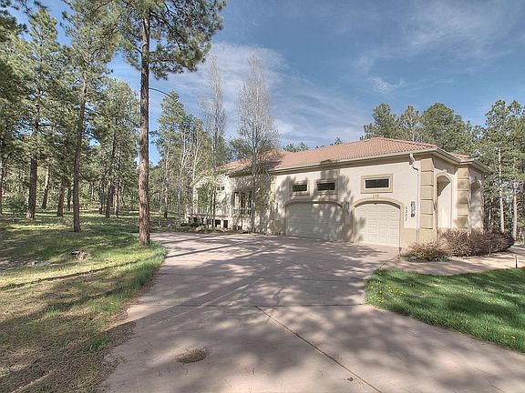 Stucco and Tile Roof.