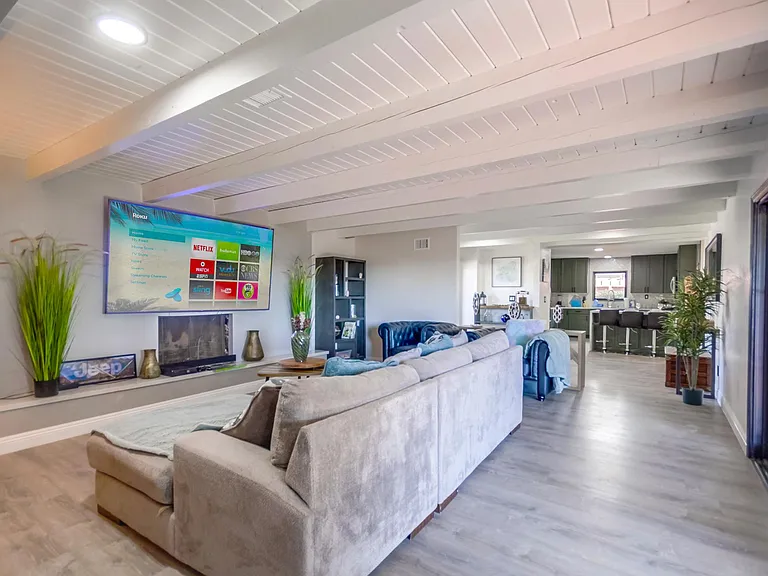 Lay back on plush sofas while streaming your favorite shows on the smart TV