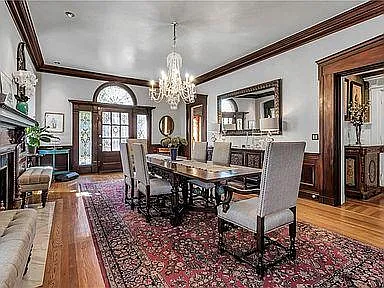 living room showing back door leading to rear deck