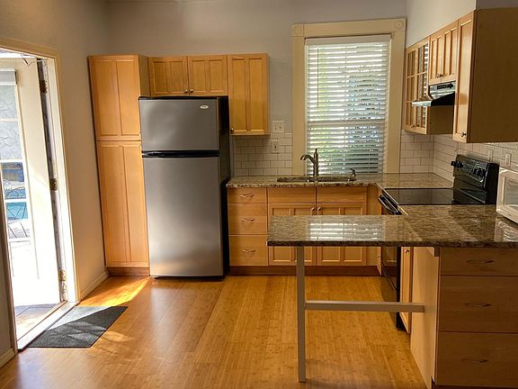 View from living room into kitchen. Nice open space.