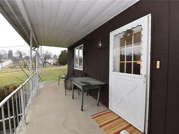 nice porch to sit out on an enjoy the peaceful setting