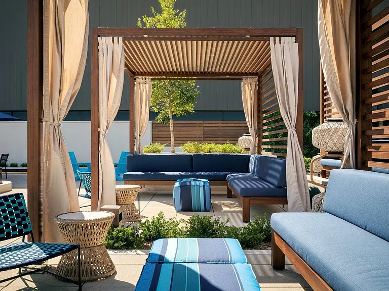 Outdoor rooftop pool for Life Time athletic resort members