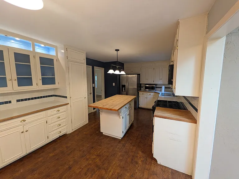 Kitchen with island (and lots of cabinet space)