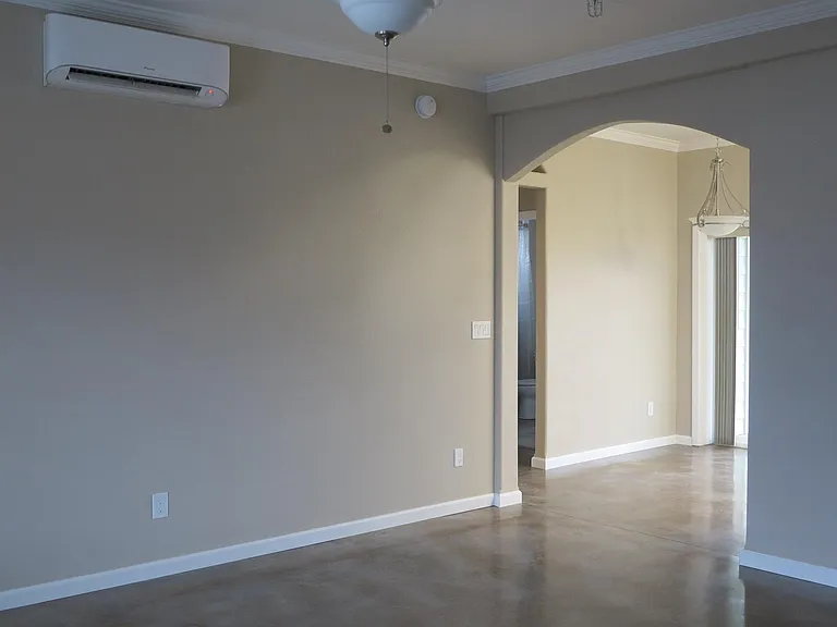Living room transitioning into the Dining Area.