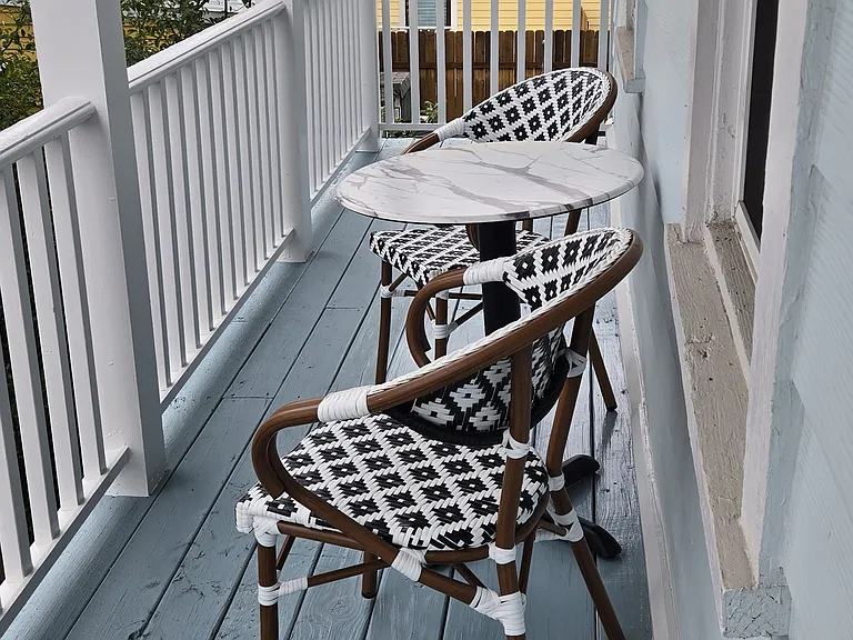 Lovely balcony with comfortable seating