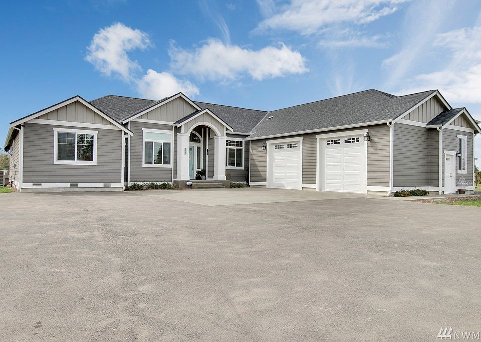 This custom built rambler is beautifully appointed on 1.7 acres within the city limits  ~ NO HOA!!