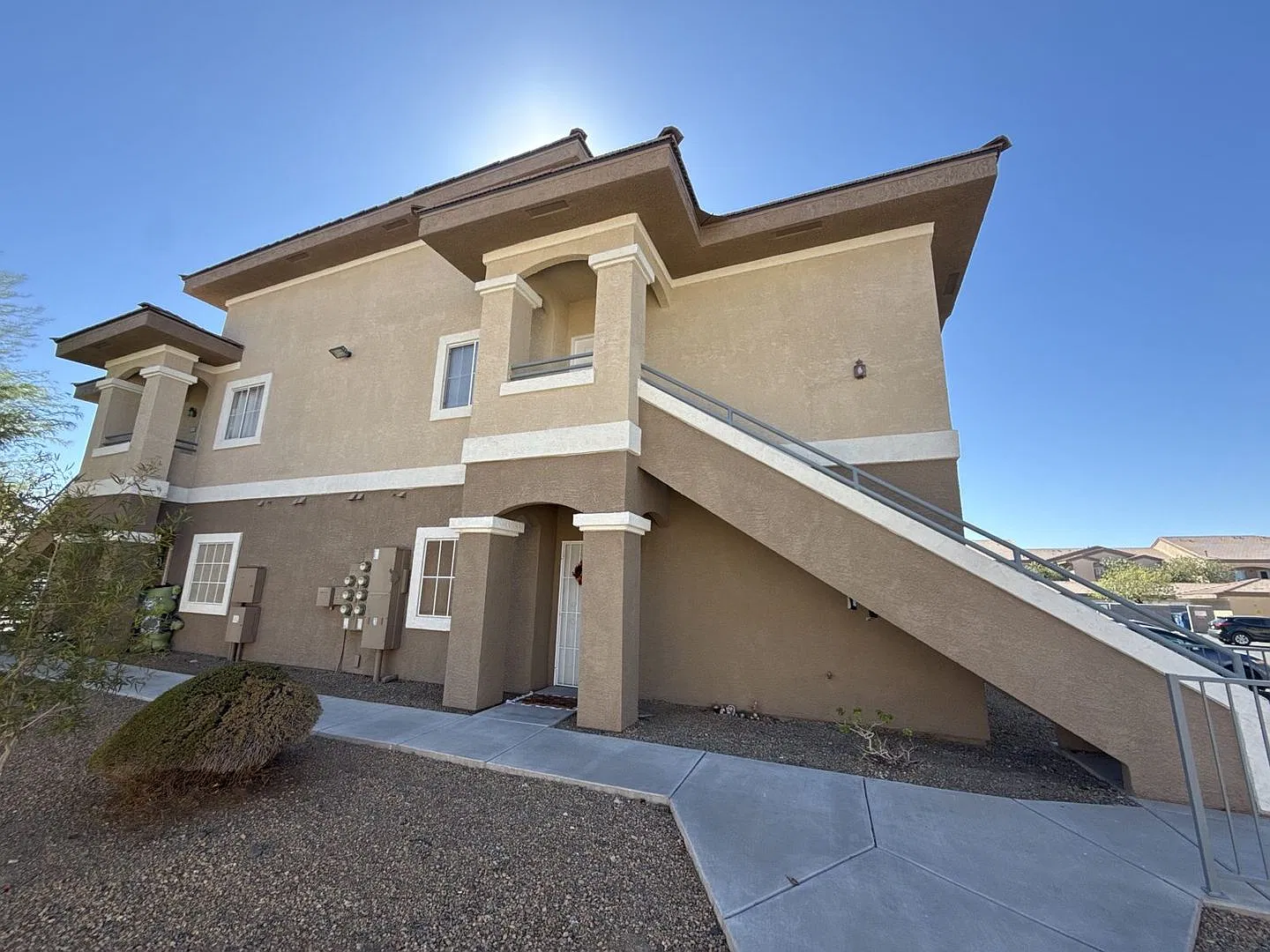 Upstairs 2-Bedroom Condo with Garage in a Gated Henderson Community — Photo 1