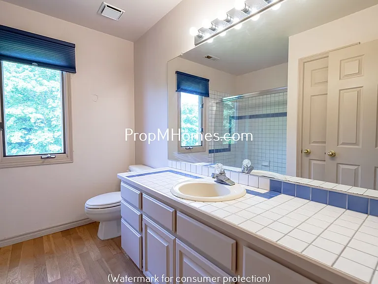 8817 NW Hazeltine St — Photo 19