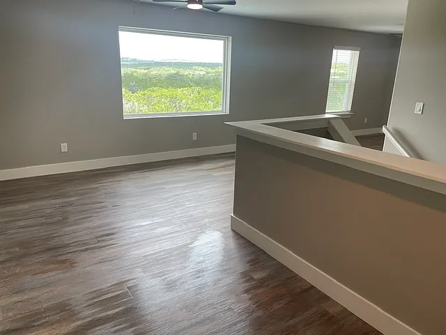 Upstairs game room with plenty of space to play.