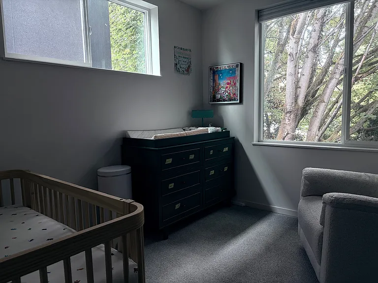 Smaller bedroom on the 2nd floor. It's currently set up as a nursery, but can also be used as an office or extra bedroom. Has a closet.