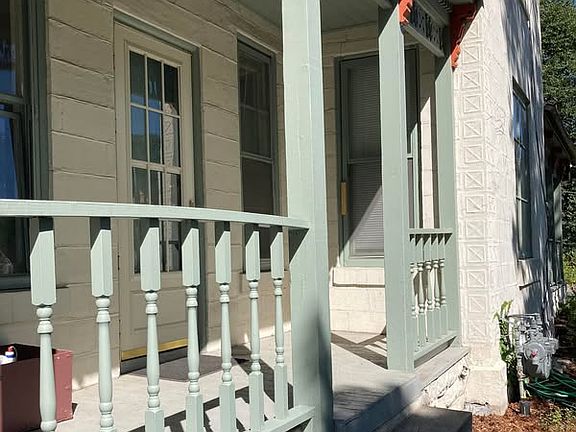 Porch with entrance to all three units.