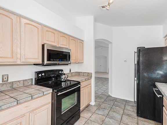 4th image of 5581 W Peaceful Dove Pl