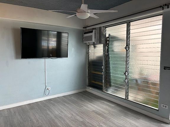 Living room are with Flat Screen TV