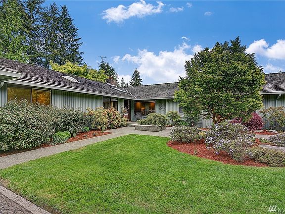 Gorgeous and tranquil landscaping, makes you feel like you've entered a park!