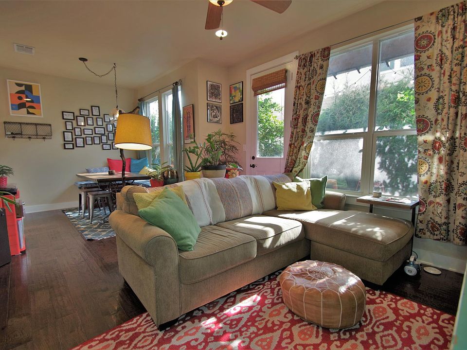 Living area, East facing windows. Door leads to covered pati