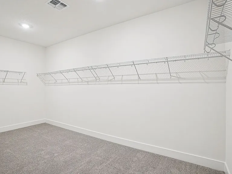 Master bedroom closet - about 16.5' x 10'