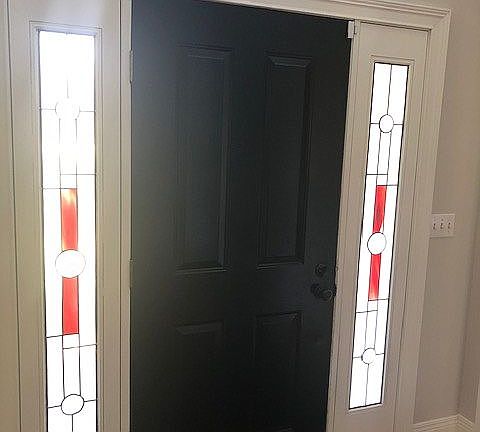 Newly painted black doors