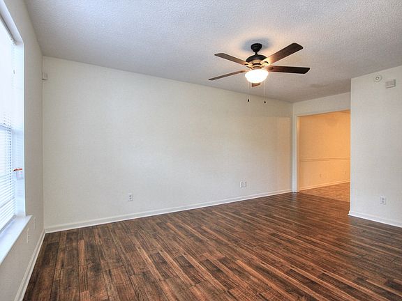 Large living room with 1/2 bath and closet