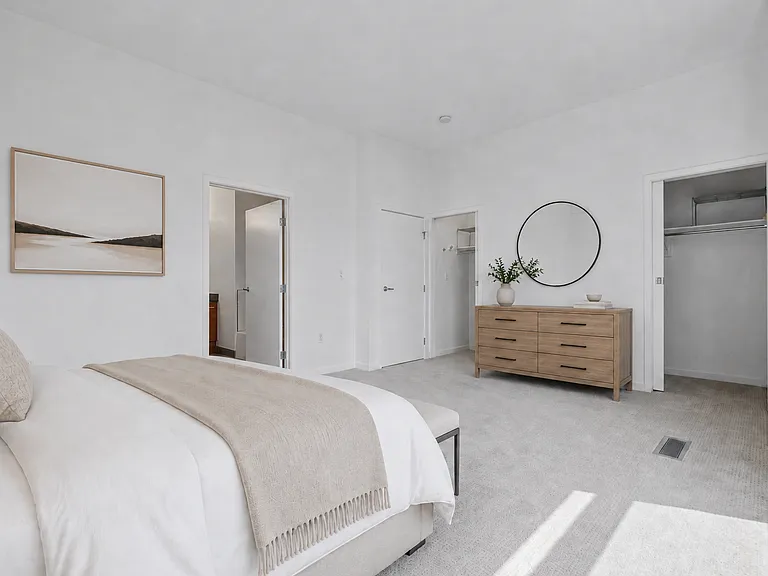 Primary bedroom - oversized. looking over the creek with double closets. *Virtually Staged