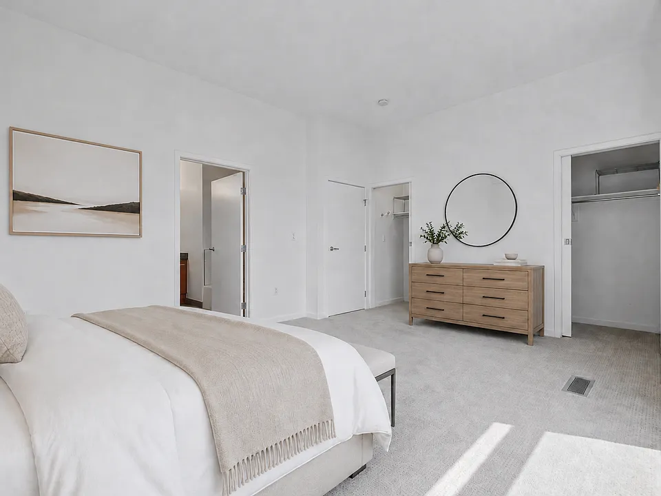 Primary bedroom - oversized. looking over the creek with double closets. *Virtually Staged