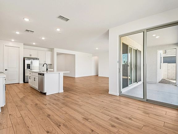 Dining into kitchen and great room. Not actual home, finishes and options may vary.
