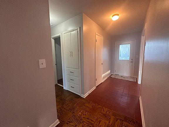 Entrance with a closet.