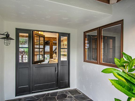 Entry to the home through the private gated courtyard