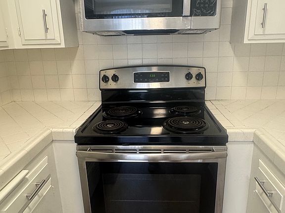 All stainless appliances and all new kitchen pulls and faucet. newly painted cabinets