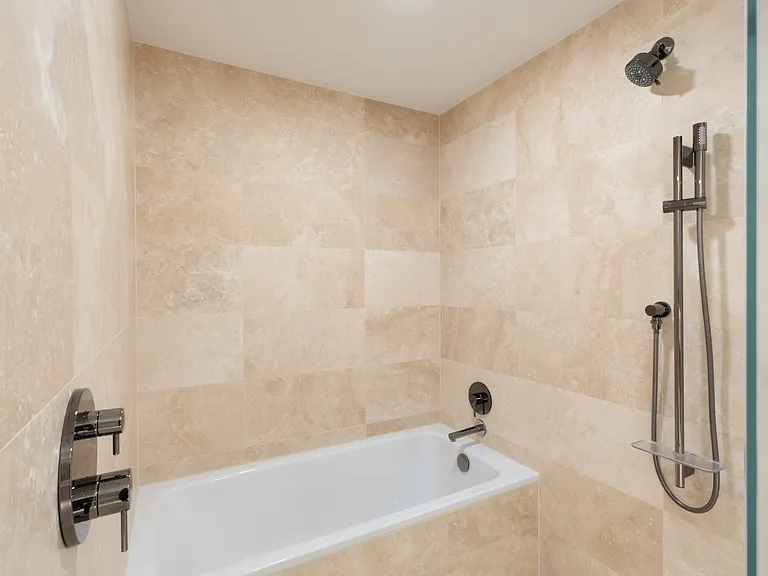 Primary bathroom with shower and separate bathtub