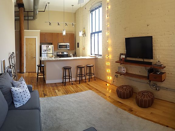 Open concept and historic brick exterior walls