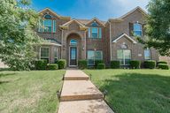 two-story-brick-home-exterior-824-regal-bluff-lane-desoto-tx.jpg.jpg