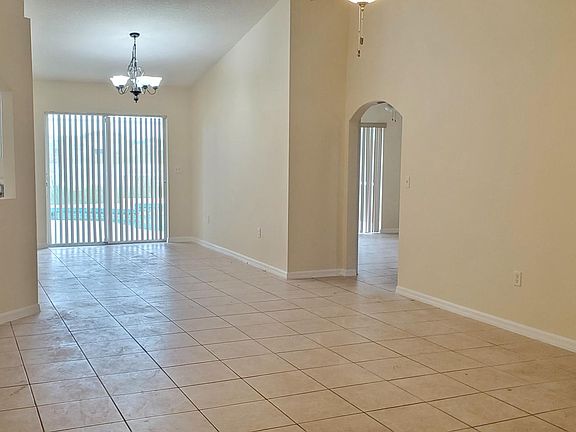 As you enter the front door you walk into the Living Room. The Dining Room to the rear. The Kitchen is are to the left after the half wall opening. Bedrooms 2 and 3 are to the right. The 2nd Bathroom is between Bedrooms 2 and 3 with its own entry.