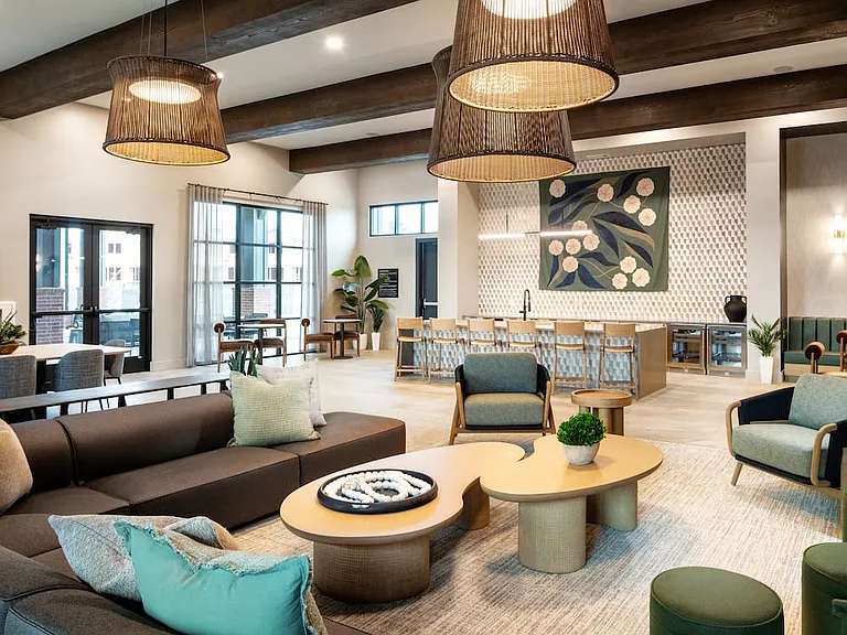 Indoor cabana lounge featuring an entertaining kitchenette and spacious seating