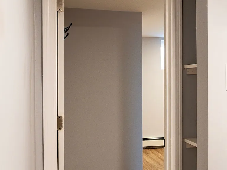 Semi-private bathroom has plenty of storage space