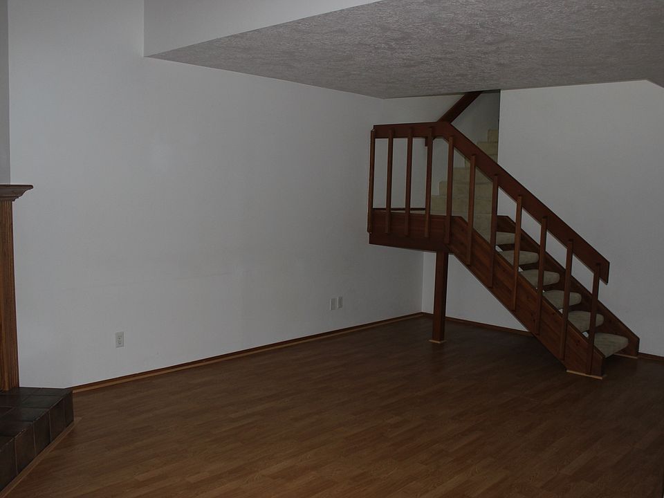 Living room, stairs to master suite