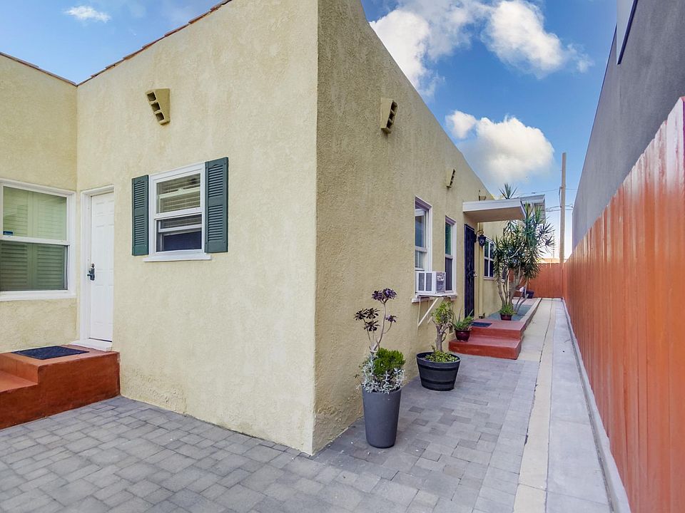 Paved & private, well-lit pathway to Rear of Property