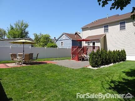 Backyard
						:
						Beautiful privacy fence surrounds entire property. Professionally landscaped.