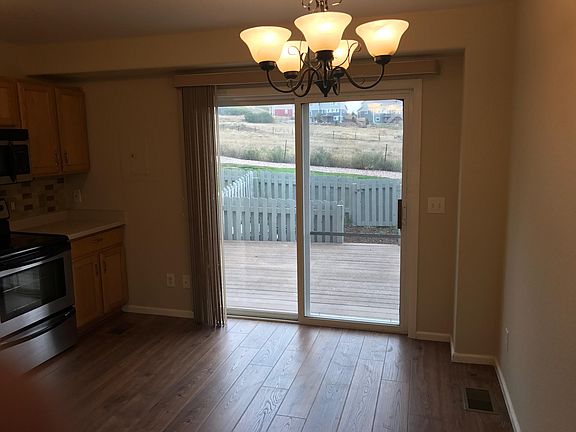 Sliding glass door to deck off kitchen.