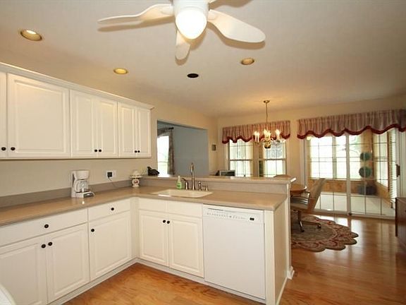 Kitchen looking toward breakfast room and sunroom