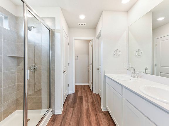 Live in luxury in the primary bathroom.