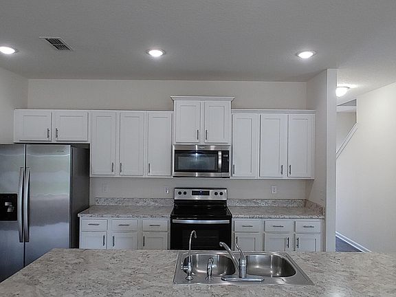 4th image of 8279 MEADOW WALK Lane