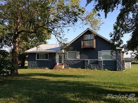 New metal roof and permanent siding installed in 2011.