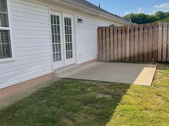 Back patio, totally fenced in