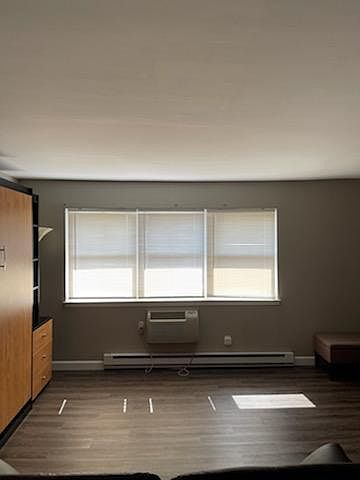 Large open layout studio with plenty of storage, cabinets and large walk in closet