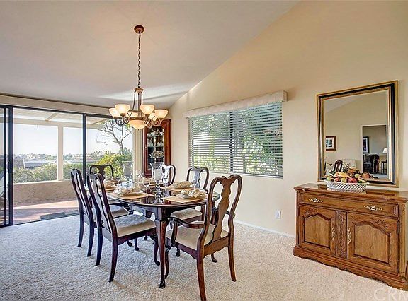Spacious dining area can accommodate large table with additional leaves for entertaining family and 