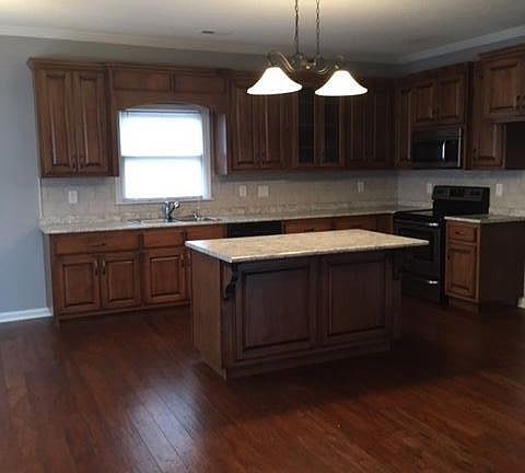 Kitchen with breakfast area and gathering room